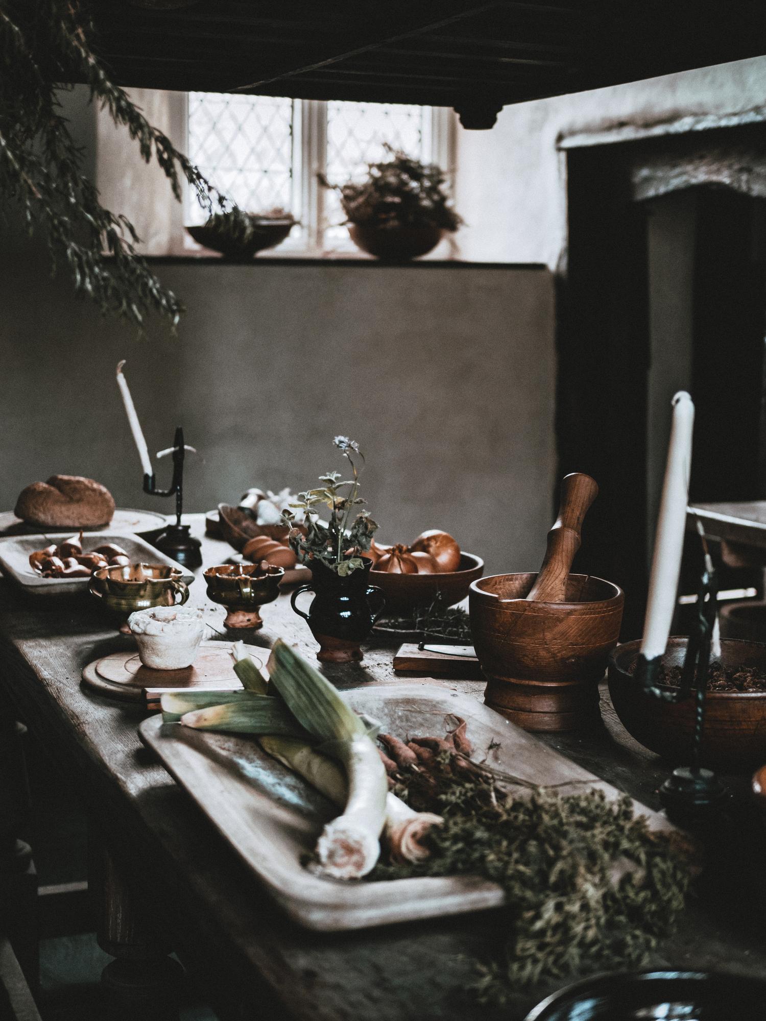 Long shot of a rustic tasting table set for eight
